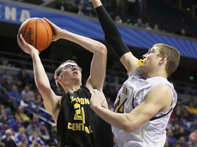 Dalton Adkins scored on a driving layup with 4.6 seconds remaining to lift Johnson Central to a 58-56 win over Campbell County on Wednesday night in the first round of the Whitaker Bank/KHSAA Sweet 16®. All photos by Walter Cornett.