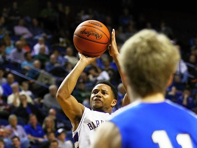 Nick Ruthsatz scored 21 points to lead Covington Catholic to a 61-54 win over Bardstown in the quarterfinals of the Whitaker Bank/KHSAA Sweet 16®. The Tigers got 14 points from Keanu Young in their first state quarterfinal appearance. L.J. Cowherd followed with 13 points and Seivon Schooling added 10 for the Tigers. All photos by Walter Cornett.