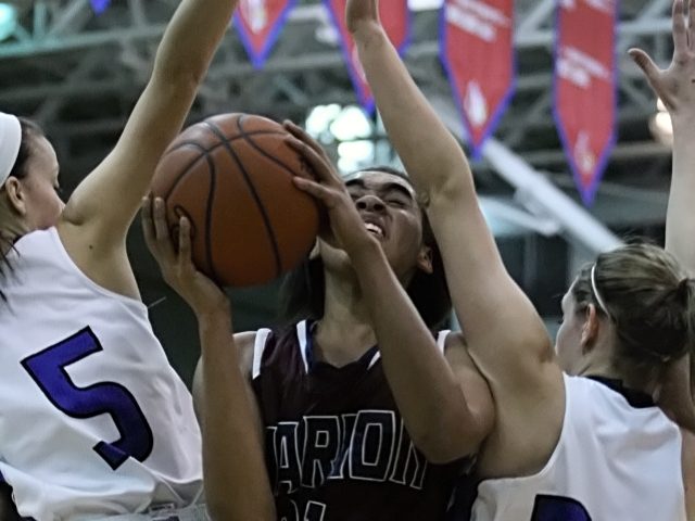 In the semi-finals of the Girls' 5th Region Tournament, Larue County defeated Marion County, 65-54, on March 8, 2014. All photos by Walter Cornett.