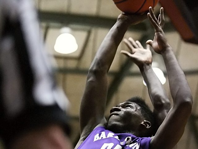 The Tigers advance to the 5th Region title game by defeating John Hardin, 68-52, on March 10, 2014. All photos by Walter Cornett.